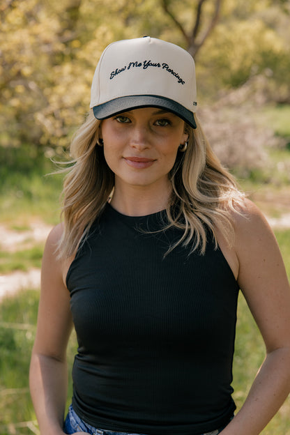 Show Me Your Piercings Trucker Hat in Black