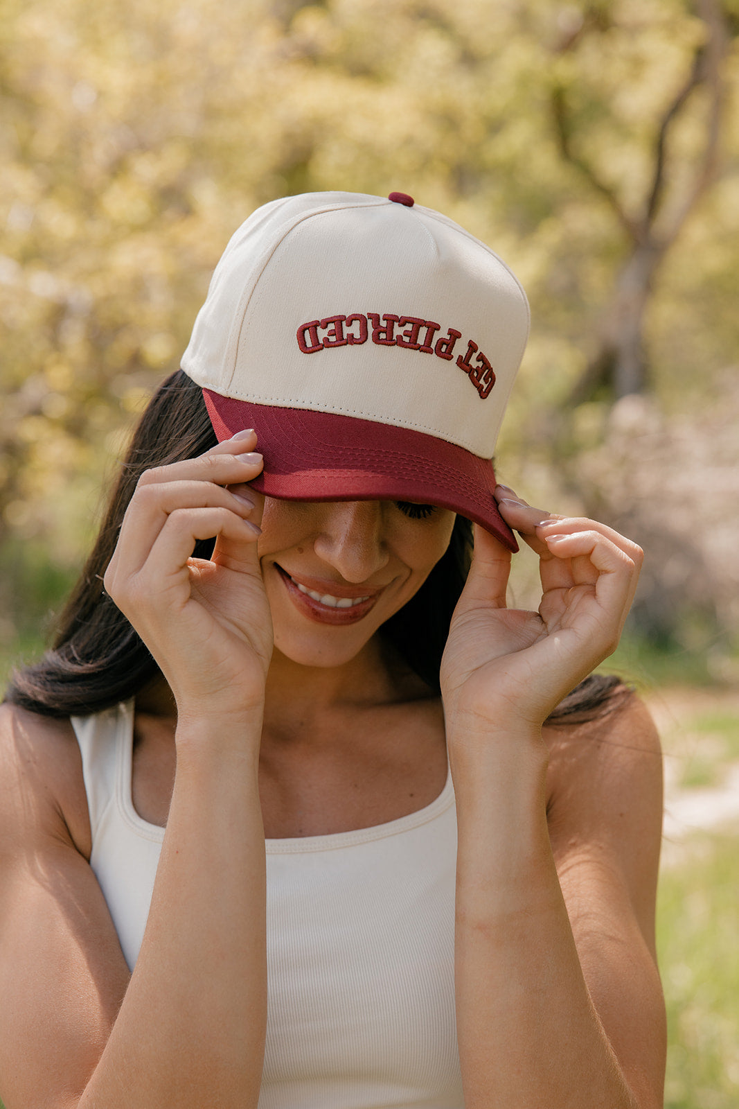 Get Pierced Trucker Hat in Berry