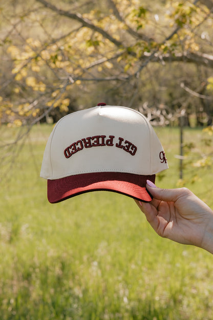 Get Pierced Trucker Hat in Berry